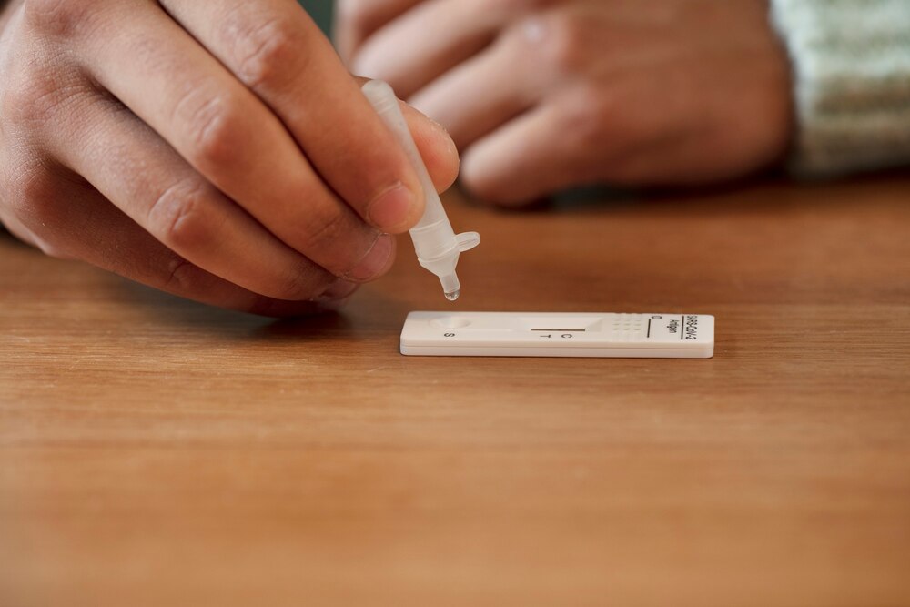 Person doing home covid test